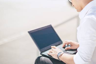 A man using his laptop